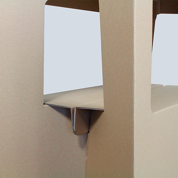 Close-up of the shelf support made from natural cardboard