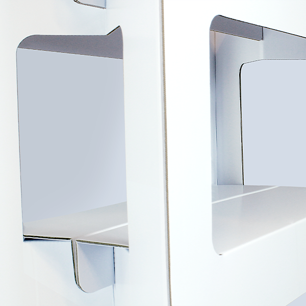 Close-up of a shelf support on a white retail display